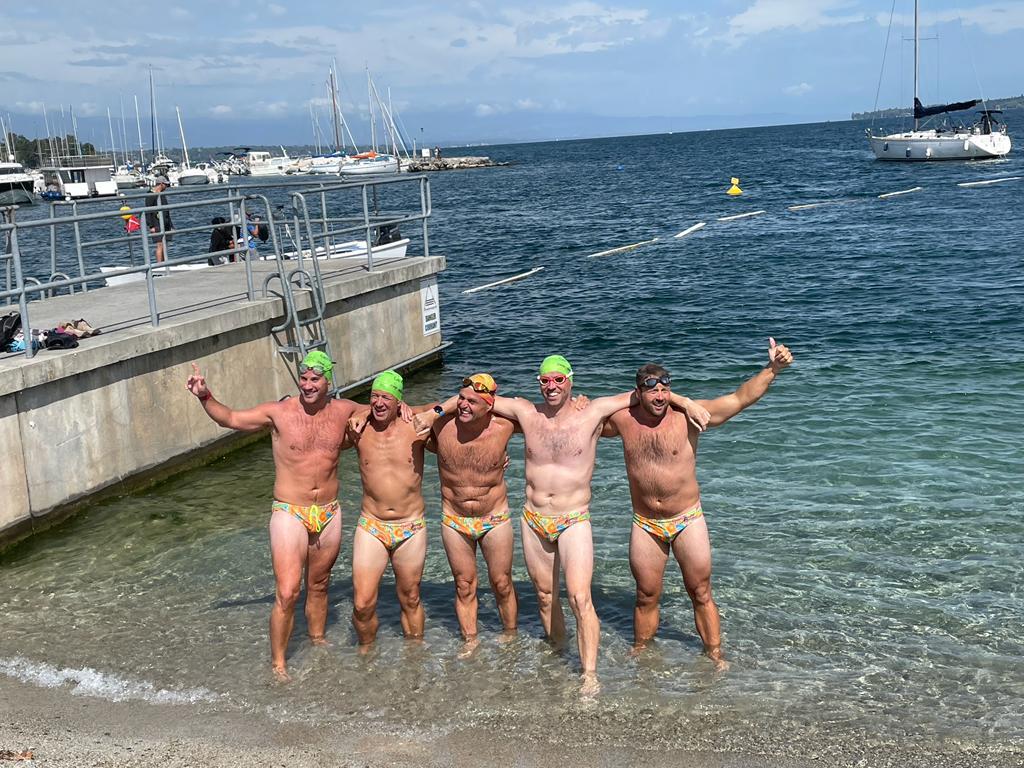 Team Baler Boys cheering at the end of the Geneva 70 swim