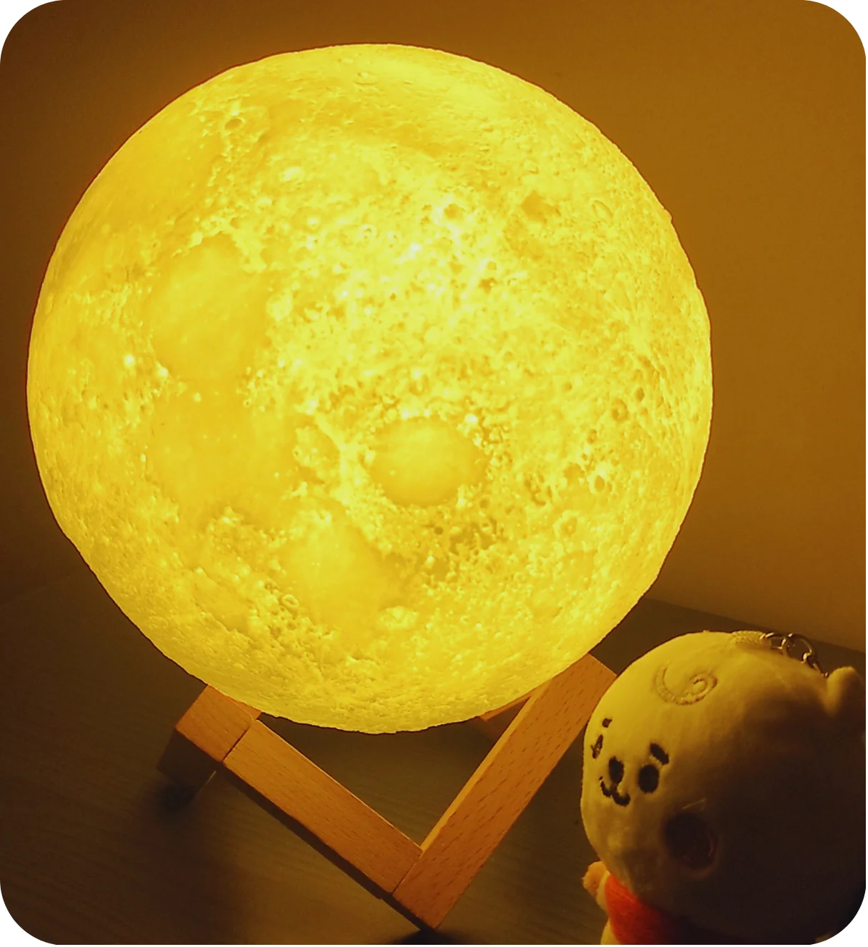 moon nightlight with child's soft toy