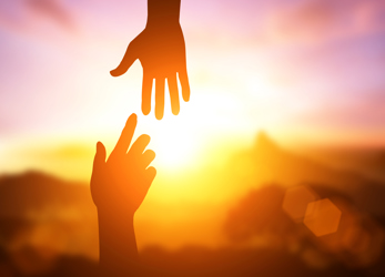 Hands Reaching Each Other At Sunset