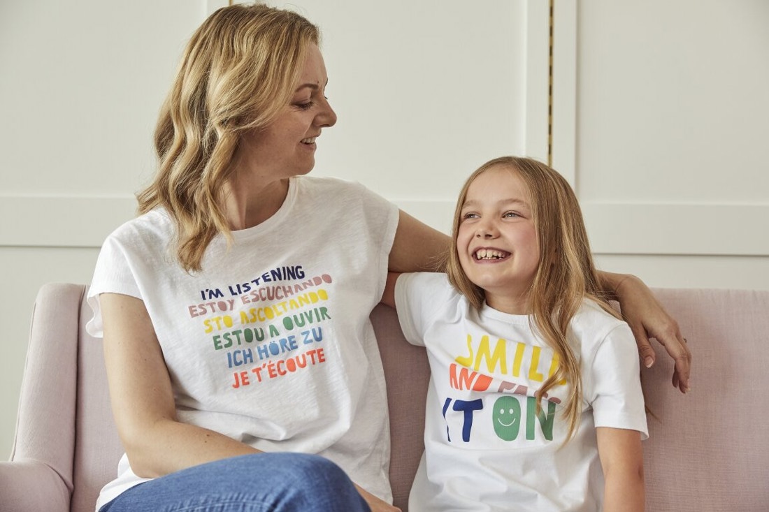 mother and daughter wearing colourful statement t-shirts