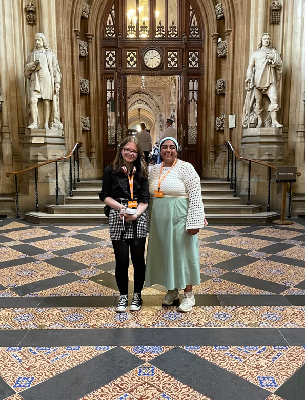 Holly And Fatima Smiling Tiled Floor PNG Right Way Up
