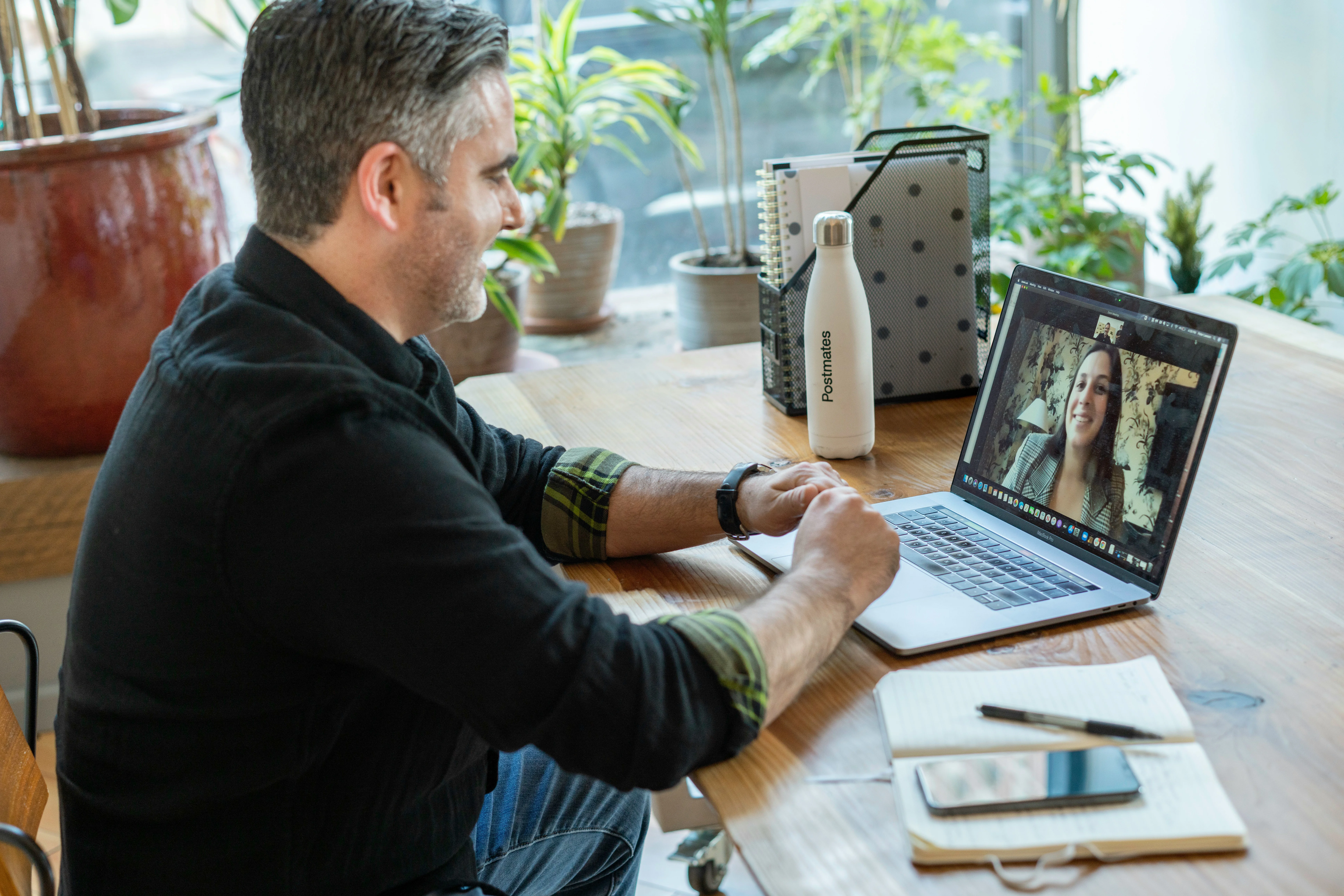 Man on a zoom call on laptop