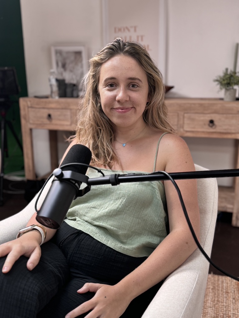 Tilly recording a podcast