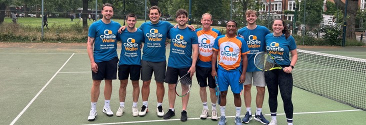 Dunhumby employees taking part in a tennis tournament for CWT