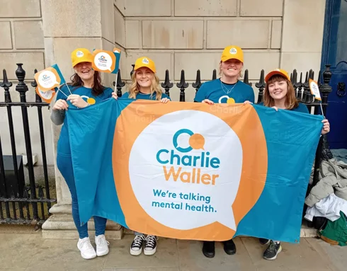 CWT staff holding banner at London Marathon