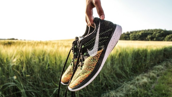 Running trainers in a meadow 