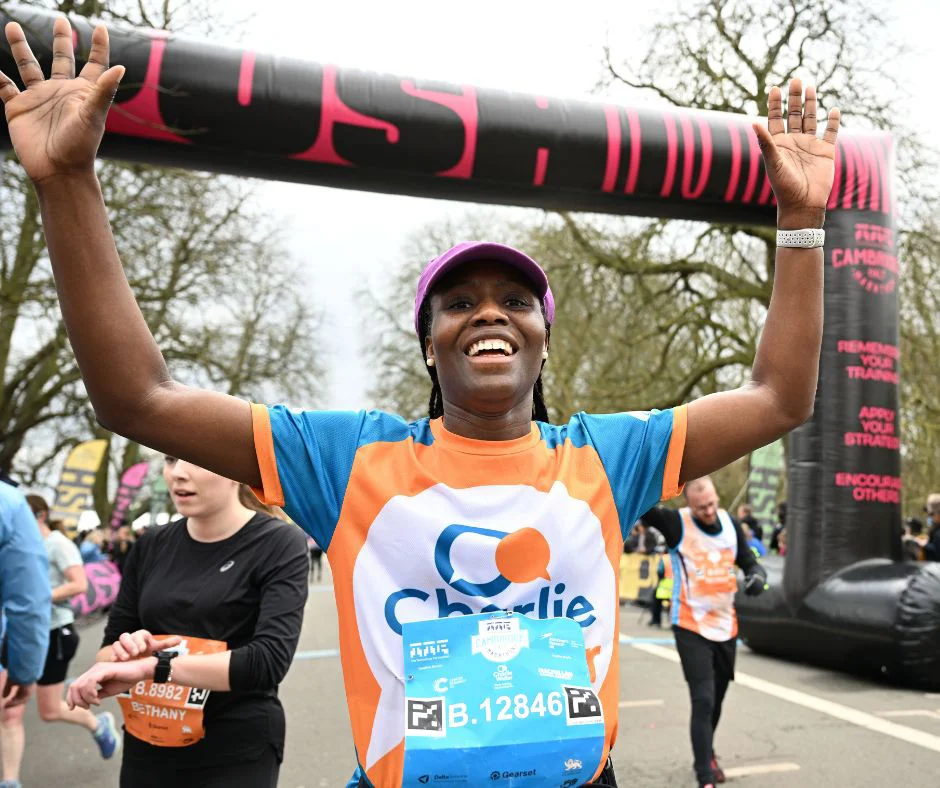 Cambridge Half runner at finish line Cambridge Half runner at finish line