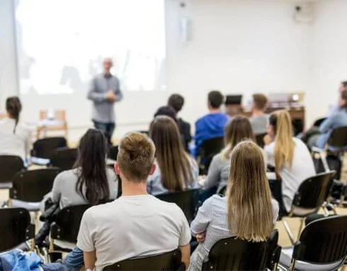 Room full of students with teacher at the front
