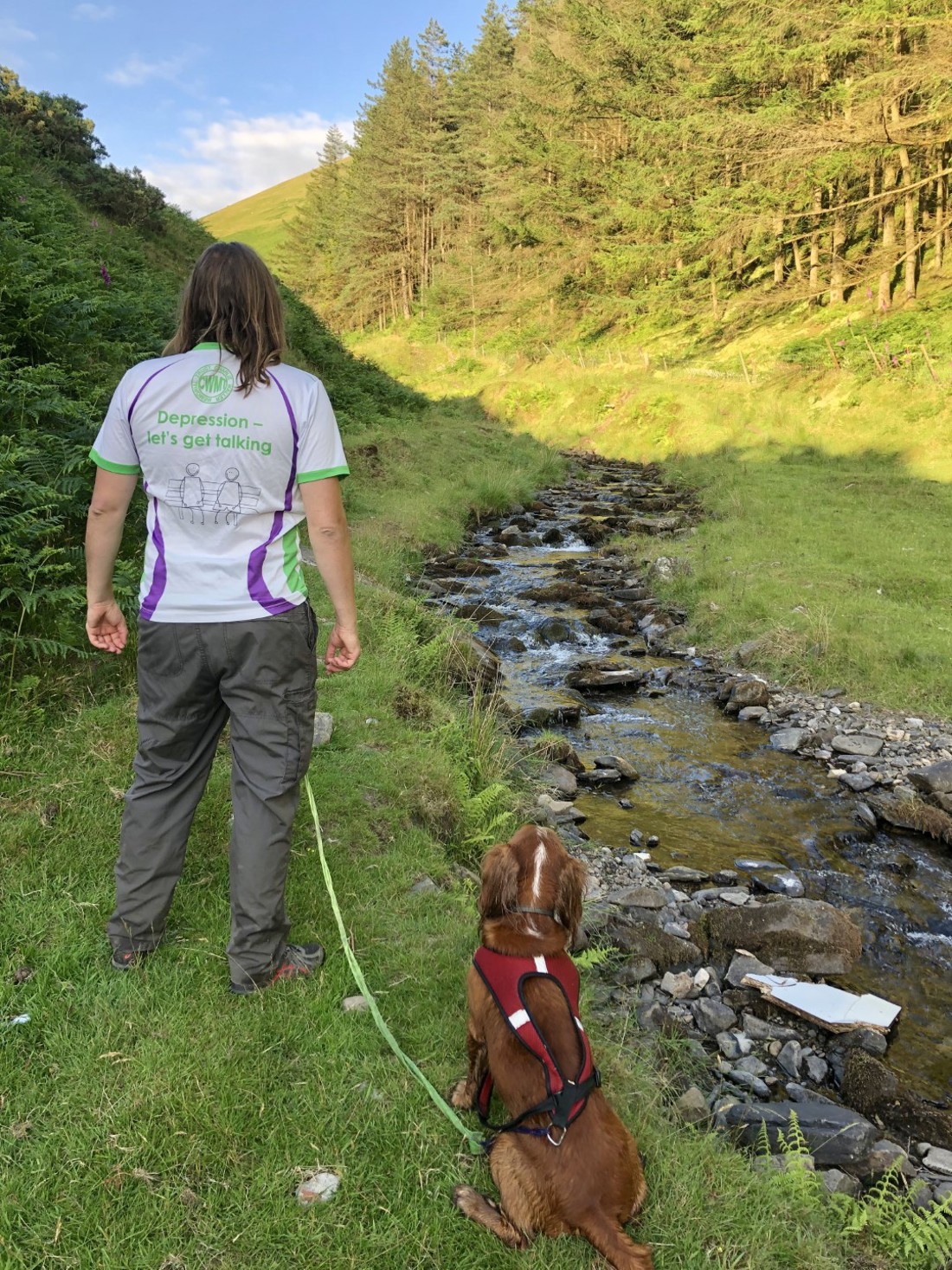 Andy and Monty stood by a stream 