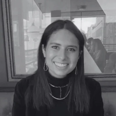 Grace, a woman with medium length hair smiling at the camera. Grace, a woman with medium length hair smiling at the camera.