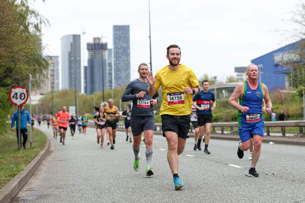 Image of people running the Manchester Marathon