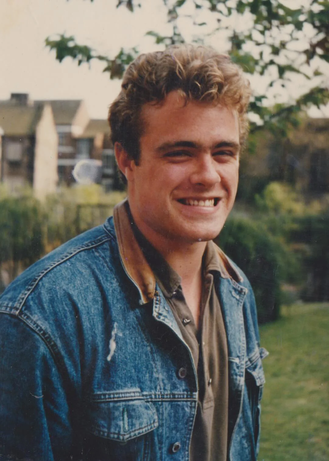 Charlie smiling at the camera