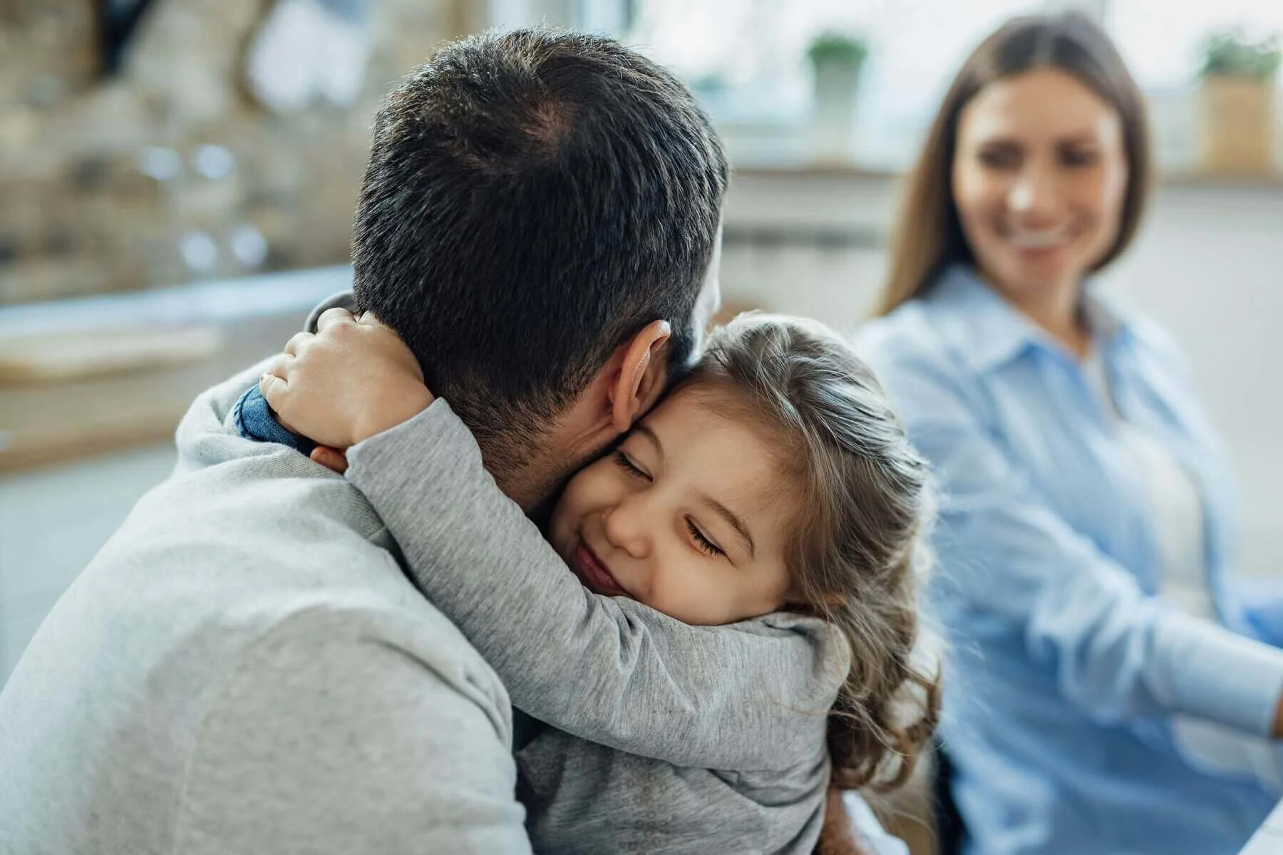 Girl Hugging Father
