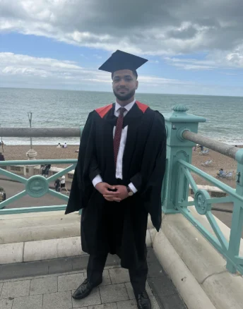Daniel in graduation attire